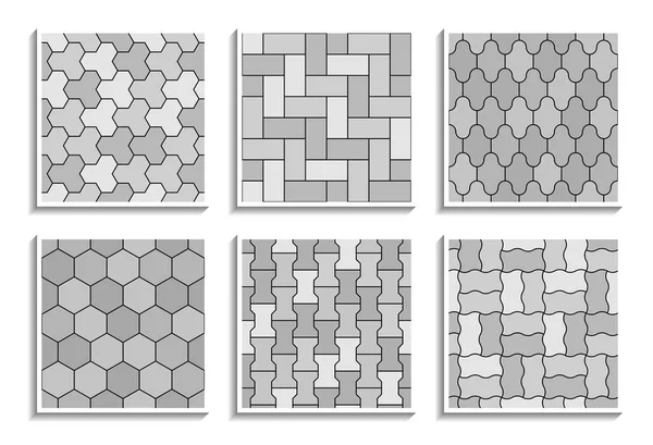 Conjunto de texturas de pavimento sem costura em tons de cinza. Padrões de repetição preto-e-branco de azulejos de rua —  Vetores de Stock