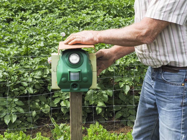 Electronic machine placed in front of a garden to scare away frighten not only birds but wild animals. France