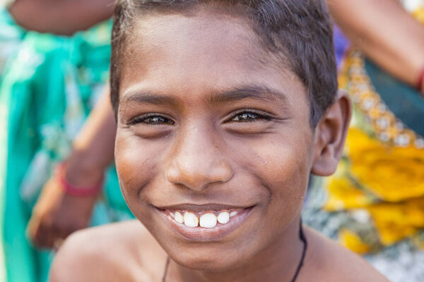 PONDICHERY, PUDUCHERRY, TAMIL NADU, INDIA - MARCH CIRCA, 2018. Unidentified Smiling face portrait of a young child or young boy from rural part of India