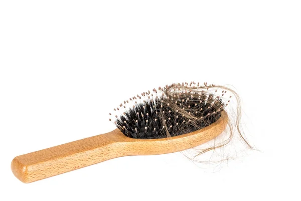 Trä Hairbrush Vit Bakgrund Närbild Med Långt Brunt Hår Hår — Stockfoto
