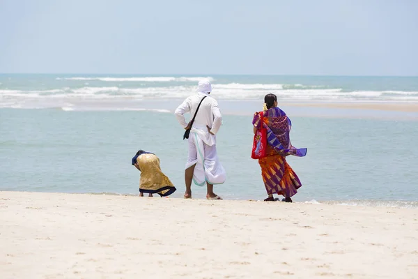 stock image Documentary editorial. DANUSHKODI, PAMBAN ISLAND, TAMIL NADU, INDIA - March circa, 2018. Unidentified young women girl couple taking a walk at beautiful sunny morning at Danushkodi beach