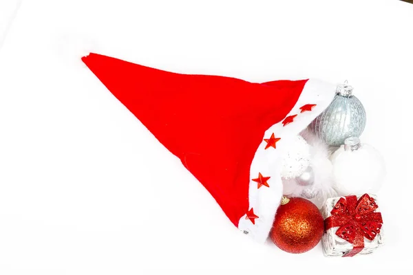 Santa Claus Hat Cap Christmas Presents Balls Ornaments White Background — Stock Photo, Image