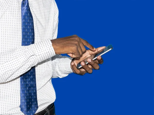 Business man black hand touching mobile phone. Focus on finger tips. Image — Stock Photo, Image
