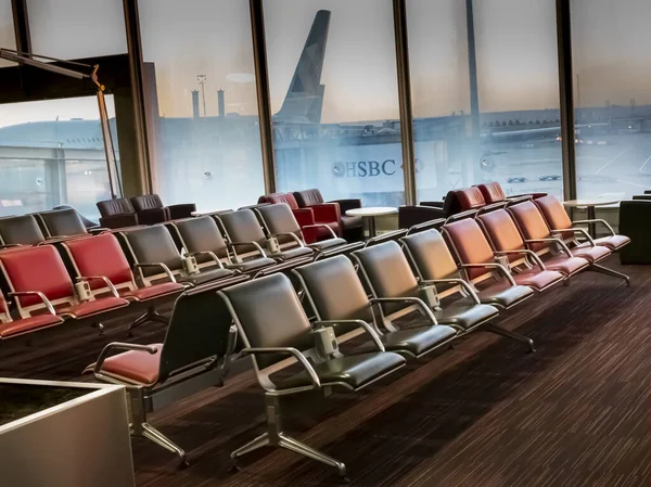 Flight cancelled. Empty chairs in the departure hall at the airport due corona. Airline companies cancel their flights due to the coronavirus outbreak. Epidemic virus COVID-19 Paris, France