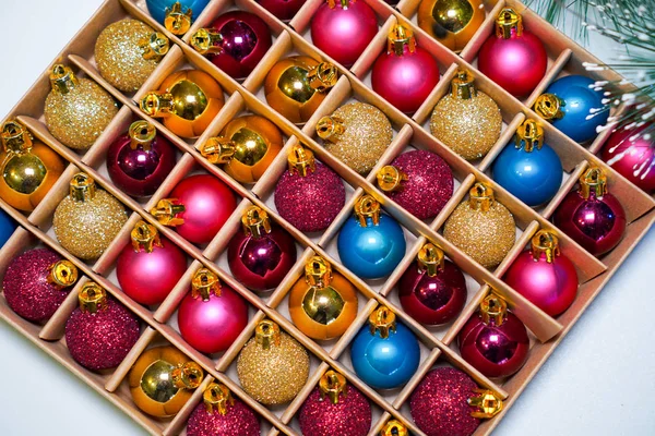 Multicolored small balls to decorate the Christmas tree. Christmas toys