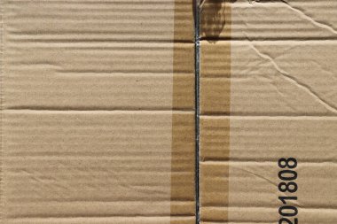 Eski eğri büğrü bir mukavvanın pis arka planı.