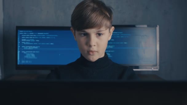 Boy Wunderkind Hacker Hacks Computer Systems. in Data Center — Stock Video