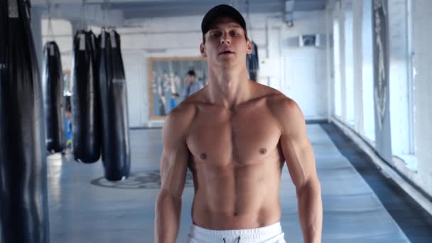 Portrait of Muscular Shirtless Man at gym. Handsome fitness athlete at workout gym — Stock Video