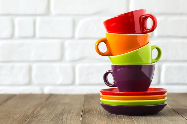 Tea, coffee cups stacked. Neutral background. Space for text. — Stock Photo, Image