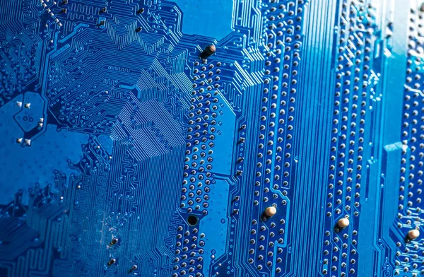 Blue circuit board background of computer motherboard — Stock Photo, Image