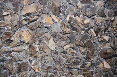 Taştan bir duvar dokusu. Eski Kalesi taş duvar doku adam