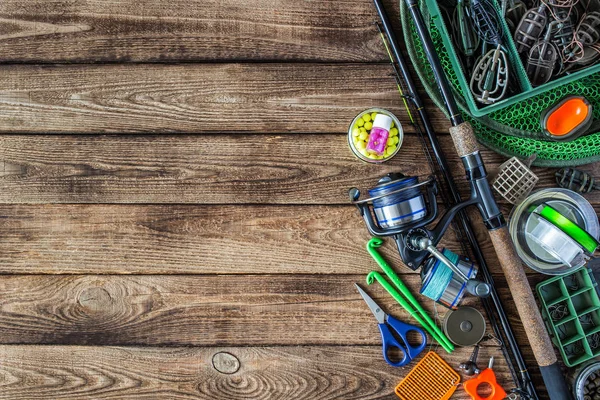 Fishing feeder and reel.Fishing tackle background.Fishing feeder — Stock Photo, Image