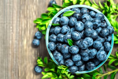 Metin için kopya alanı ile taze yaban mersini arka plan. Mavi