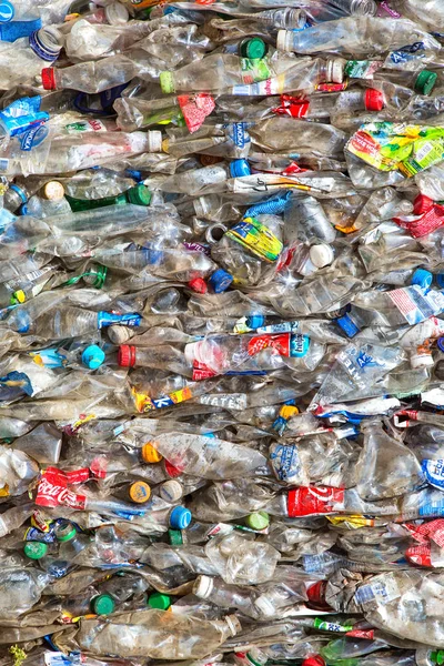 Plastic bottles pressed and packed for recycling. recycling To c — Stock Photo, Image