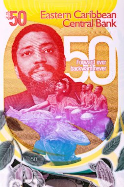 Doğu Karayipler 'e ait 50 Doğu Karayip doları 2024. Doğu Karayipler' in hatıra banknotu piyasada yok ve Grenada 'nın bağımsızlığının 50. yıldönümü ve Eric Gary' nin.