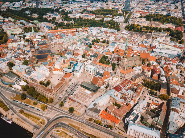July 2, 2018. Riga, Latvia. Aerial view of Riga city - capital of Latvia. Amazing view on the river Daugava, old town, national library, bridges over the river and the main TV tower.