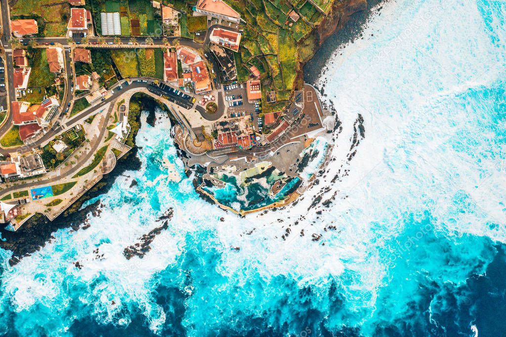 Aerial view of the village of Porto Moniz with lava-rock pool, Madeira Island, Portugal