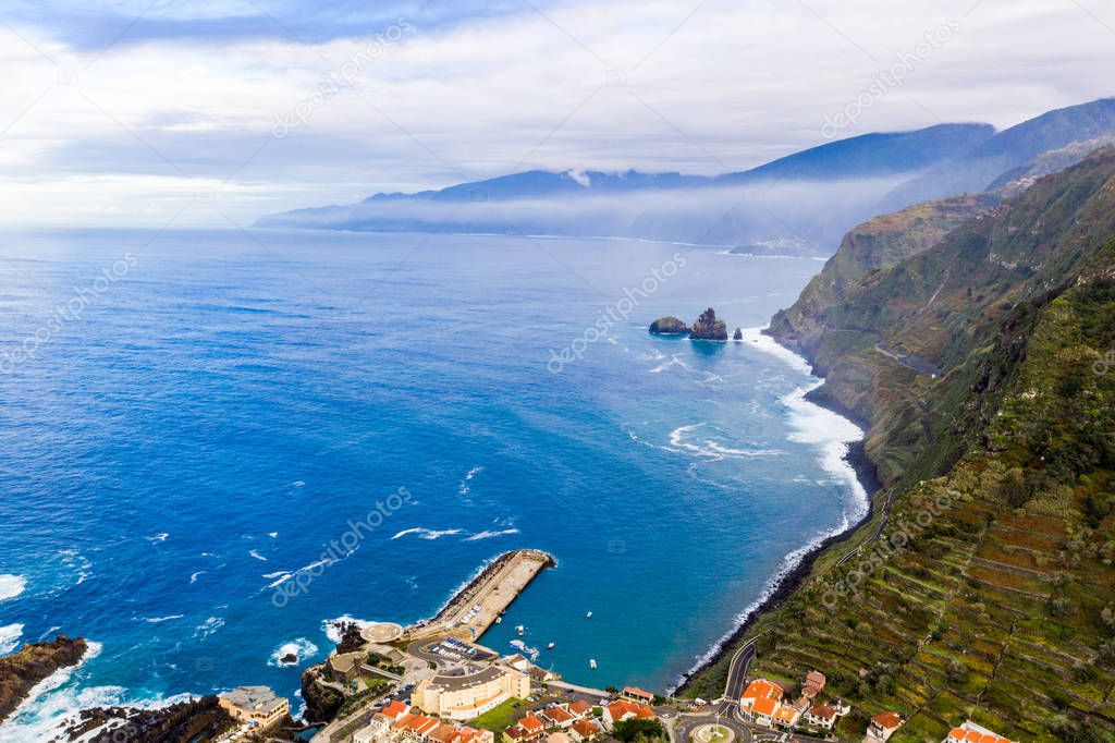 Aerial view of the village of Porto Moniz with lava-rock pool, Madeira Island, Portugal