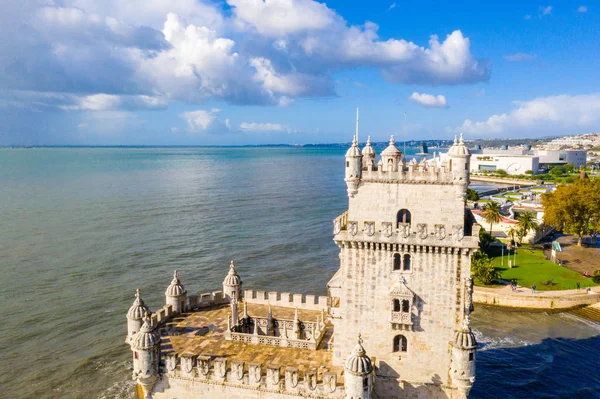 Aerial drone panorama photo of the Belem Tower. A medieval castle fortification on the Tagus river of Lisbon, Portugal.