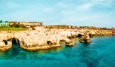 Beautiful Cyprus, Konnos Bay in Cape Greko natural park, rock arch near of Ayia Napa and promenade (molos) Limassol Cyprus and aerial photo of Limassol  clipart
