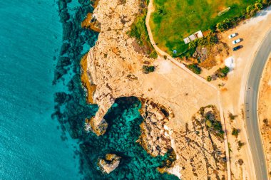 Nissi beach in Ayia Napa, clean aerial photo of famous tourist beach in Cyprus. The best resort area of Cyprus, Nissi beach, the hotels, gulfs, parks. clipart