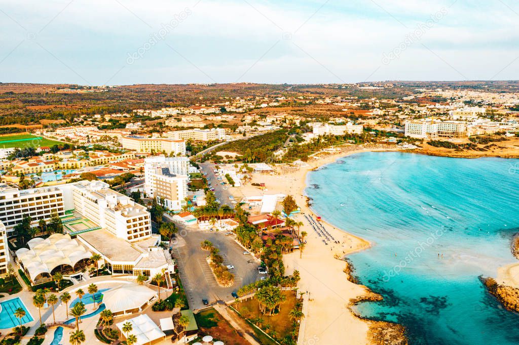 Nissi beach in Ayia Napa, clean aerial photo of famous tourist beach in Cyprus. The best resort area of Cyprus, Nissi beach, the hotels, gulfs, parks.