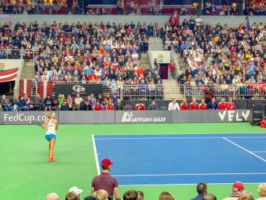 09.02.2019 - Riga, Letonya. Fedcup Bnp Paribas, takım Letonya ve Arena Riga takımı Slovakya arasında Dünya Kupası, Tenis dünya II ilk tura oyunu. Alona Ostapenko Rebecca Ramkov karşı. 