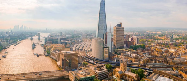 Beautiful panoramic view of the London city from above. Skyscrapers in London city district near Tower Bridge.