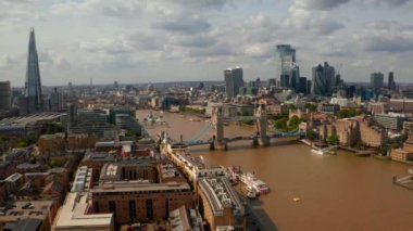Aerial view of the Tower Bridge, city of London and the Shard skyscraper. 