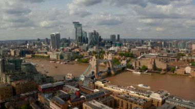 Aerial view of the Tower Bridge, city of London and the Shard skyscraper. 