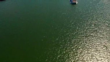 Aerial view of the San Diego harbour near the Downtown, CA. Flying near the docks and USS Midway carrier.