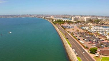 Aerial view of the San Diego harbour near the Downtown, CA. Flying near the docks and USS Midway carrier.