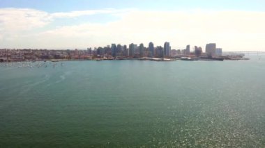 Aerial view of the San Diego harbour near the Downtown, CA. Flying near the docks and USS Midway carrier.