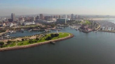 Beautiful aerial view around mothers beach at Long Beach in Los Angeles, USA. Flying over the yachts near Queen Mary ship.