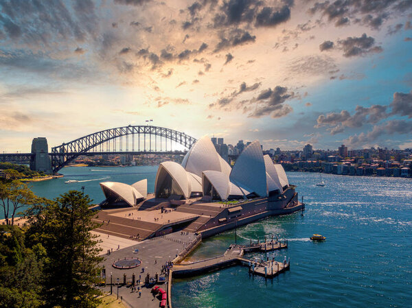 June 20, 2020. Sydney, Australia. Beautiful aerial view of the Sydney city from above with Harbour bridge, Opera house and the harbour.