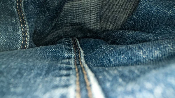 牛仔裤面料的宏观滑向侧面 纺织品 — 图库照片