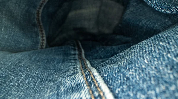 牛仔裤面料的宏观滑向侧面 纺织品 — 图库照片