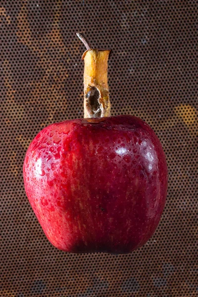 Red apple with sick heart — Stock Photo, Image