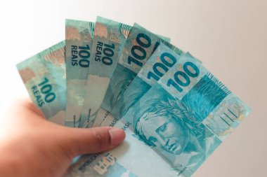 Brezilya 'dan gelen para. Real 'in notları, madeni paralar, Brezilya para birimi, Brezilya BRL. Tasarruf, maaş, ödeme ve fon kavramı.