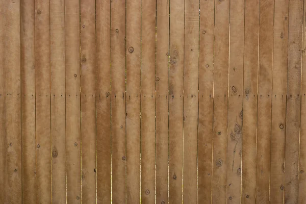Motif brun, lattes verticales en bois dans la clôture — Photo