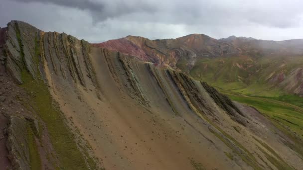 Aerial drone panoramic view of the rainbow colored mountain and huge Andes peaks of Peru, Latin America — Stock Video