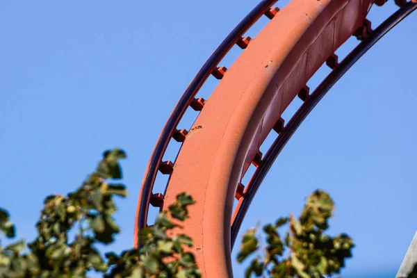 Rollercoaster against blue sky in the evening — Stock Photo, Image