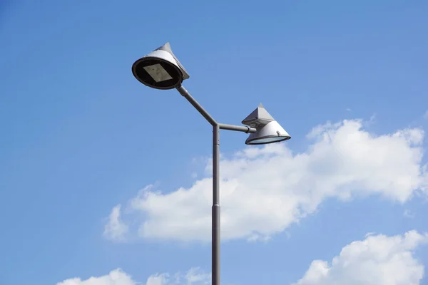 Poles led. Street light against the blue sky with clouds. copy space.