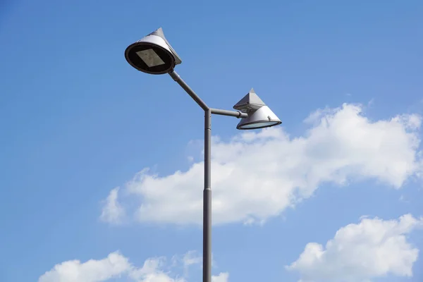 Poles led. Street light against the blue sky with clouds. copy space. — Stock Photo, Image