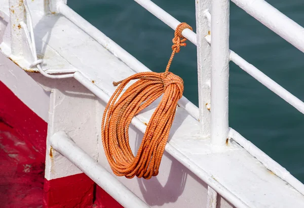 Ropes on Old Rusty Ship Closeup. Old Frayed Boat Rope as a Nautical Background. Naval Ropes on a Pier. Vintage Nautical Knots. Big Marine Sea Ship Ropes.