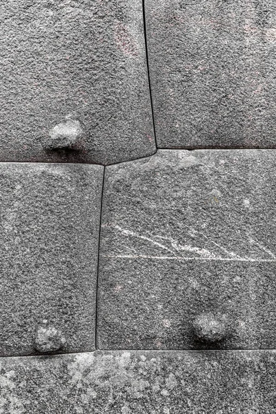 Granite blocks in the ancient fortress of the Incas are adjusted to each other with a minimum gap in which even the razor blade will not fit.