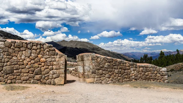 Stone gate in the wall of the temple of the ancient Incas on the outskirts of Cusco.