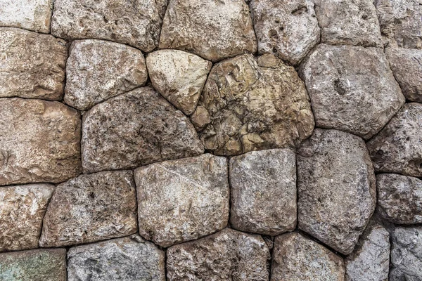 Granite blocks in the ancient fortress of the Incas are adjusted to each other with a minimum gap in which even the razor blade will not fit.