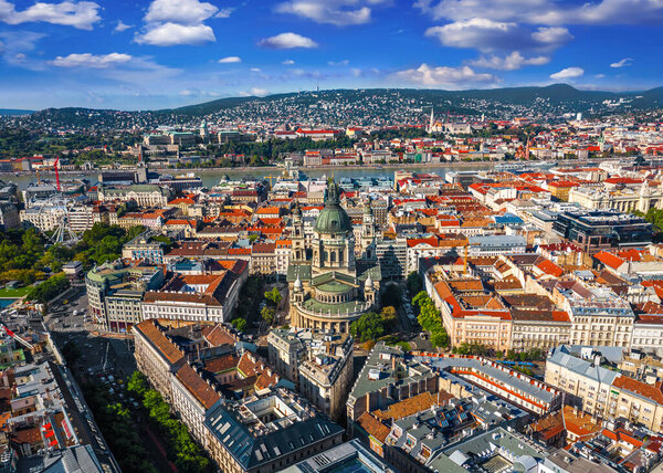 Budapest, Hungary - Aerial skyline view of Budapest with St.Stephen's Basilica. Szechenyi Chain Bridge, Elisabeth Square, Buda Castle Royal Palace, ferris wheel at background on a sunny summer day