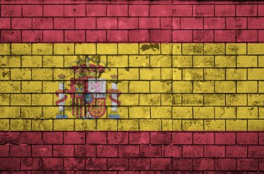 İspanya bayrağı eski bir tuğla duvara boyanmış.